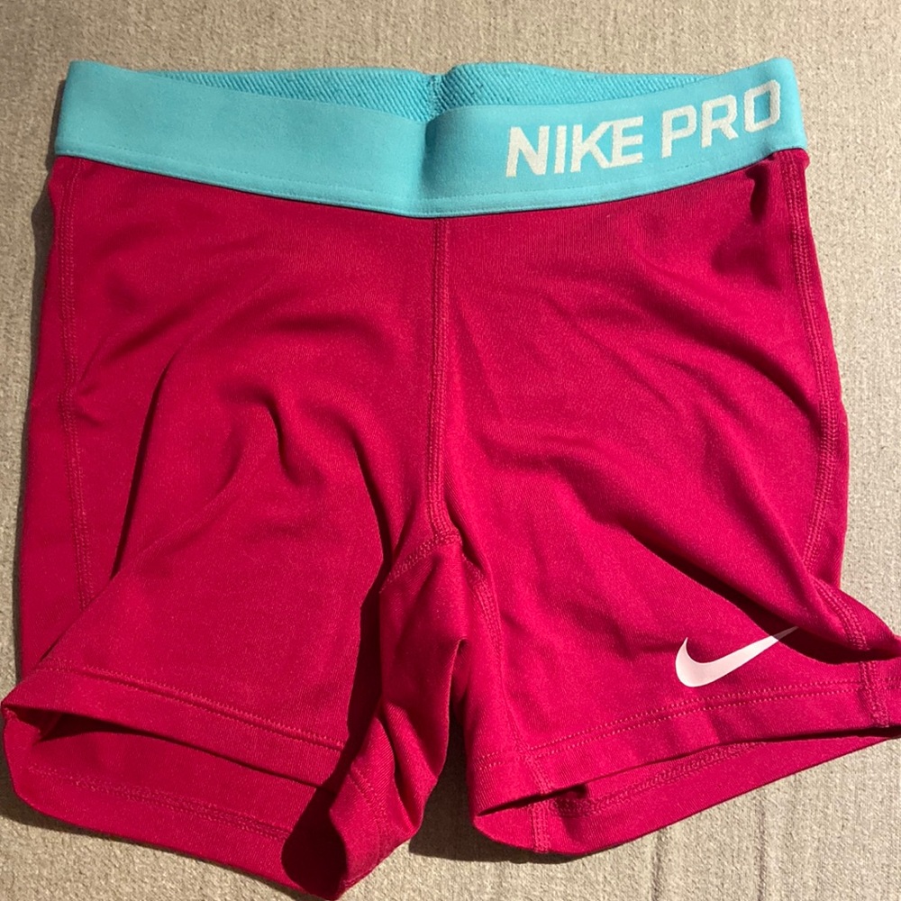 Pink youth medium Nike pros